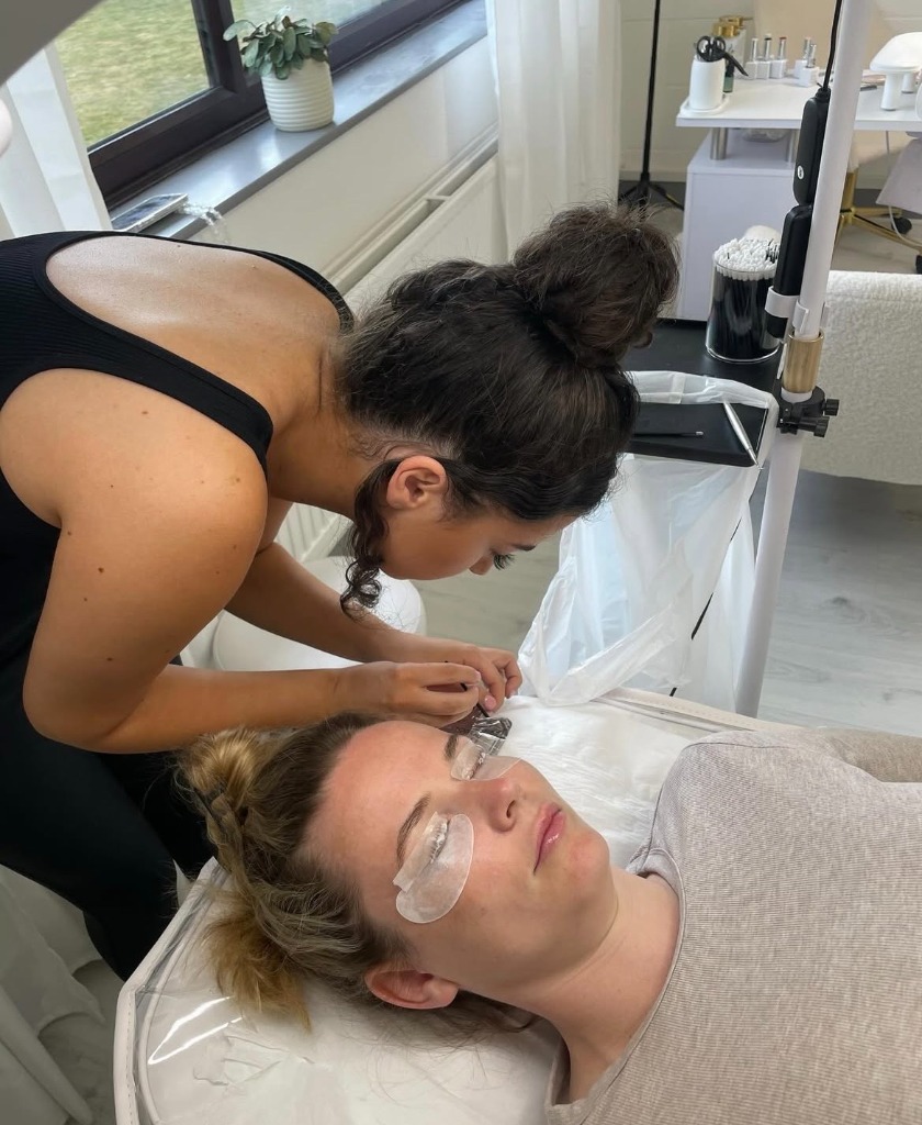 Shayla Lisa performing a beauty treatment at Bellabe Beauty